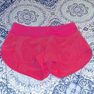 Gently used 2.5” Lululemon speed up lined low rise shorts coral pink